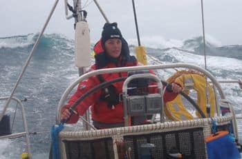 JLB_091127_Lindsey on the helm in the Southern Ocean_PB260644_351